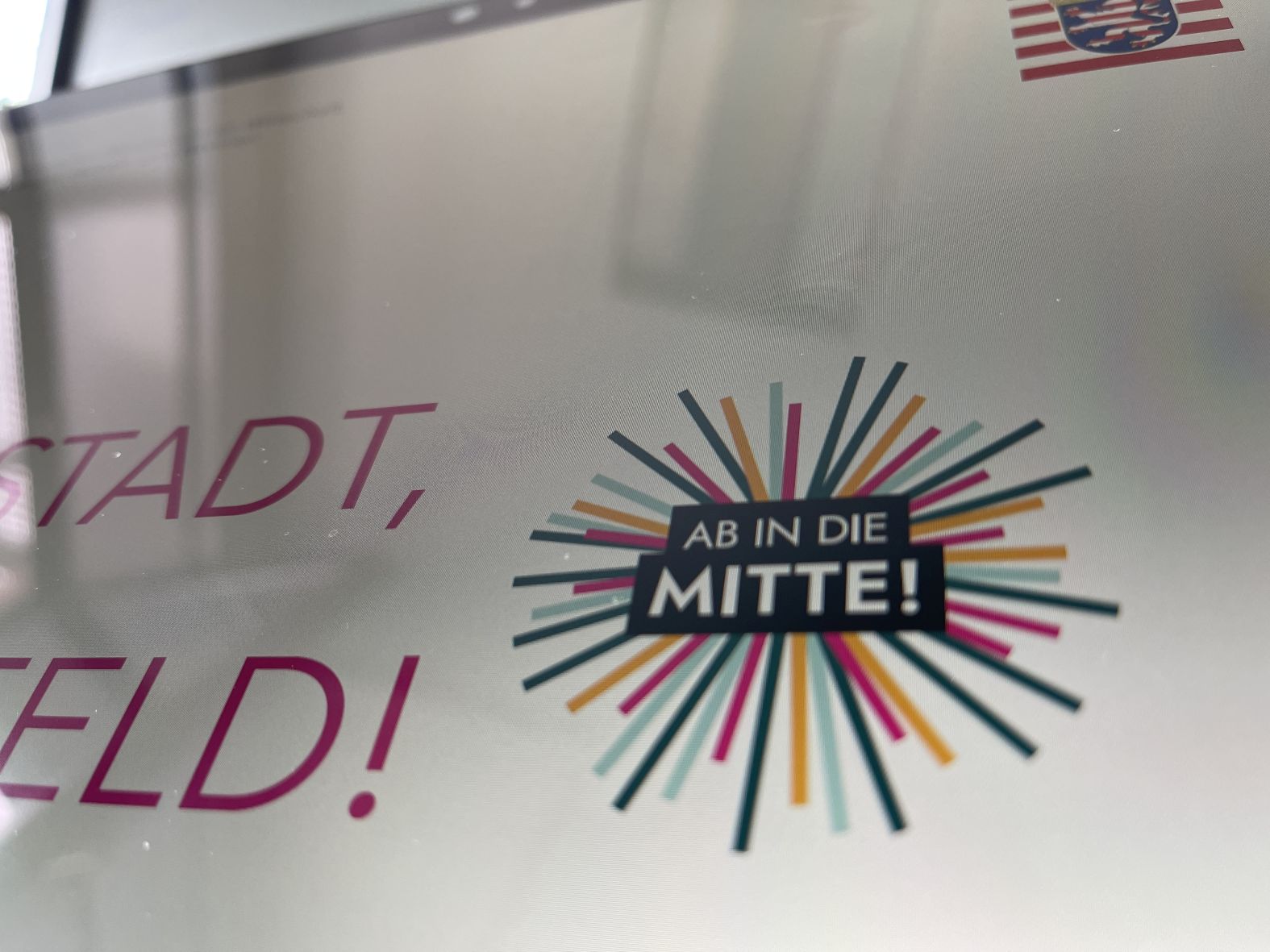 Logo des Landeswettbewerbs "Ab in die Mitte"
